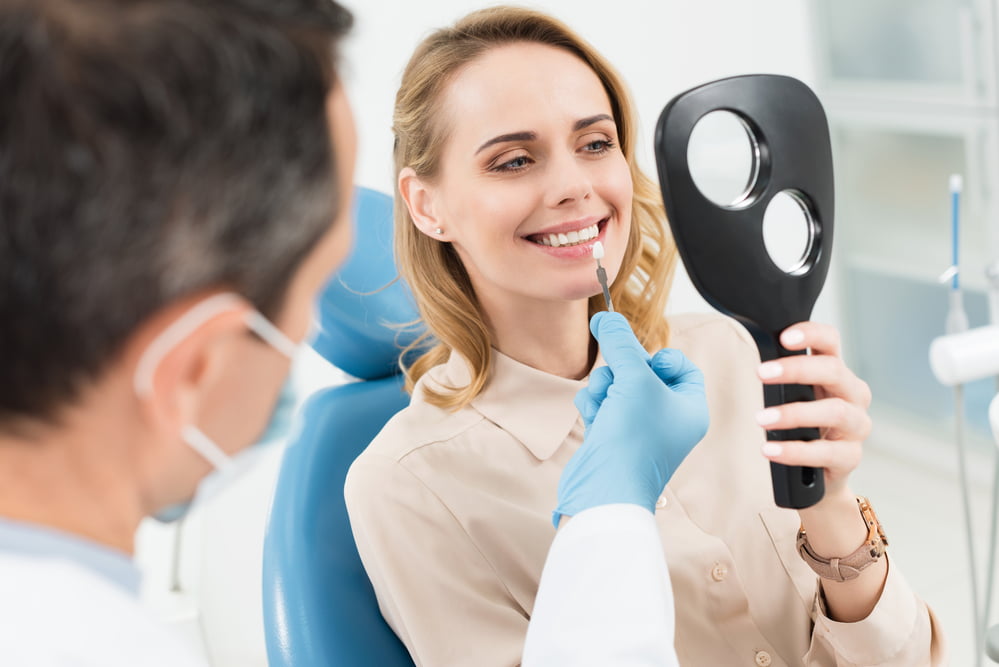 Como deixar os dentes retos? 3 dentes